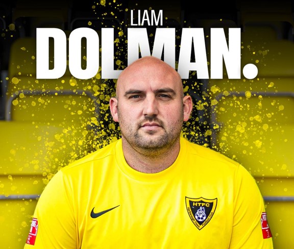 Liam Dolman signs!